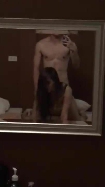 Asian doggy in the mirror