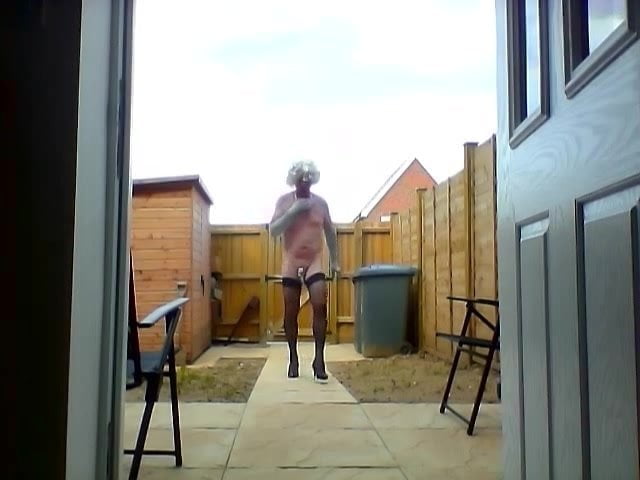 sissy ken does a quick walk into the garden