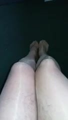 Feet & legs in sheer tights