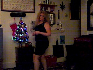 Sexy Blonde MILF Rocking Around the Christmas Tree