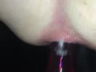 Slow motion anal abuse with glass dildo