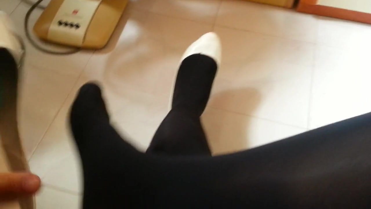White Patent Pumps With Black Pantyhose Teaser 32