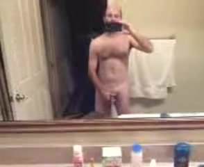 cock stroking in the mirror