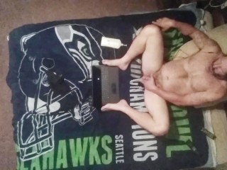 Seahawk fan masturbating on my bed with ceiling cam.