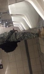 black military showing in restroom