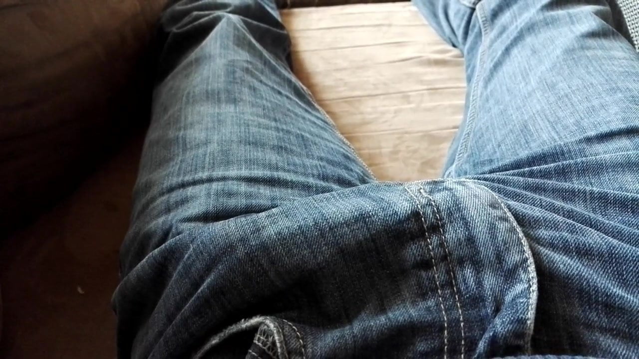 My cock throbbing in my jeans