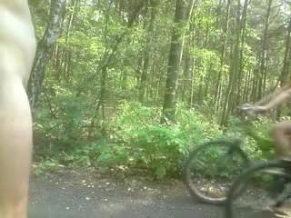 2 girl on the bike in forest