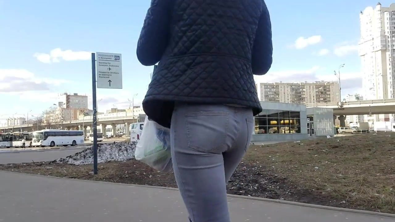 Ass in grey jeans
