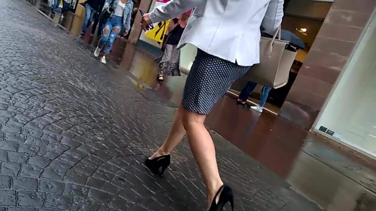 Sexy MILF with heels walking