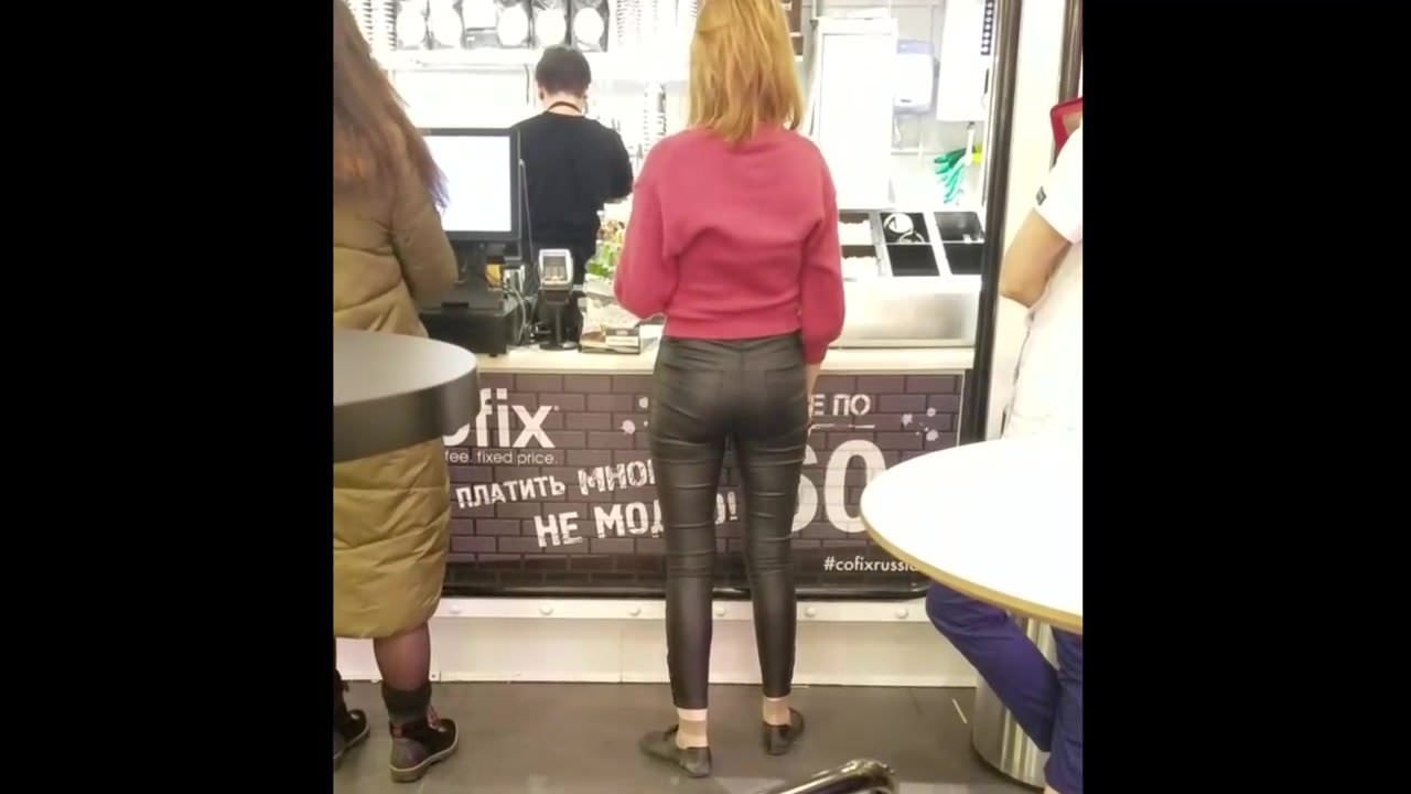 Ginger girl with ass in leather pants