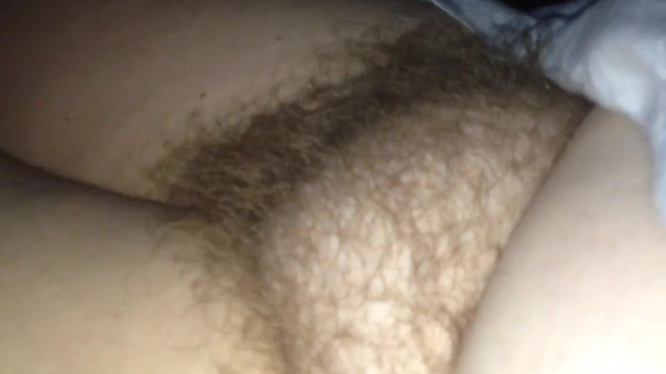 revealing her soft hairy pussy early in the morning