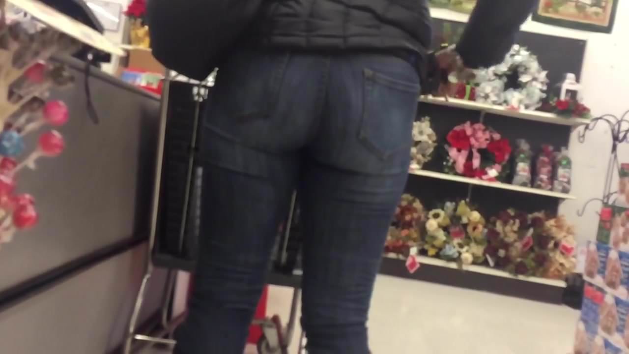 Sexy ebony in tight blue jeans candid in store - xxxCandid