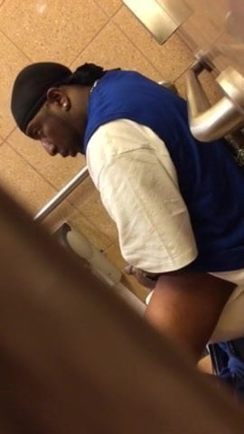 spy - black guy jerking in toilets