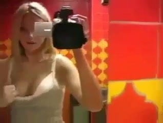 blond girl playing in bathroom