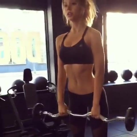 Alexis Ren working out bending over