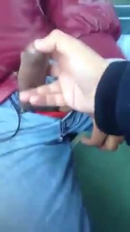 Playing with his cock in train
