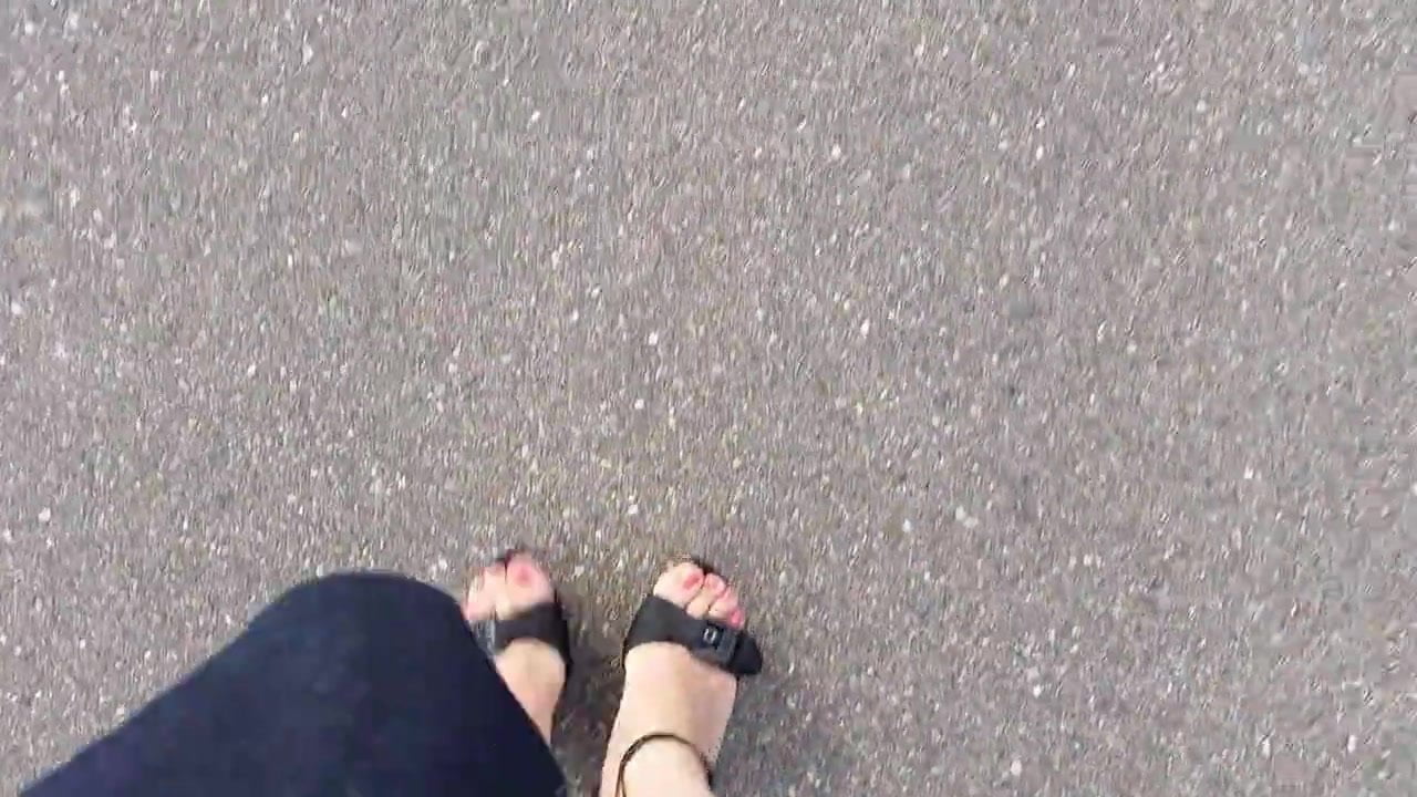 CD feet walking in wedge sandals