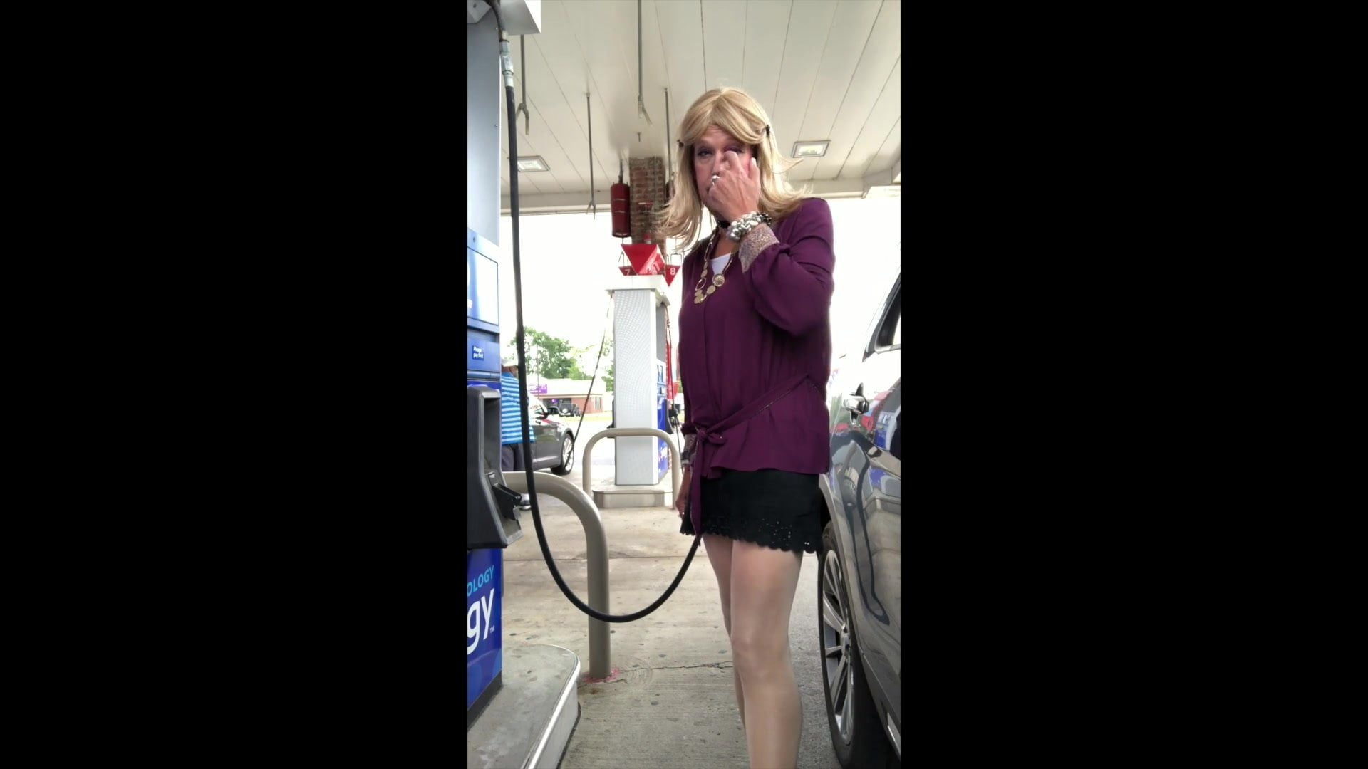 Gas station in Purple top and pantyhose