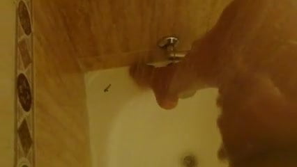 giving me pleasure in the bathtub