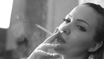 sexy brunette smokes in BW