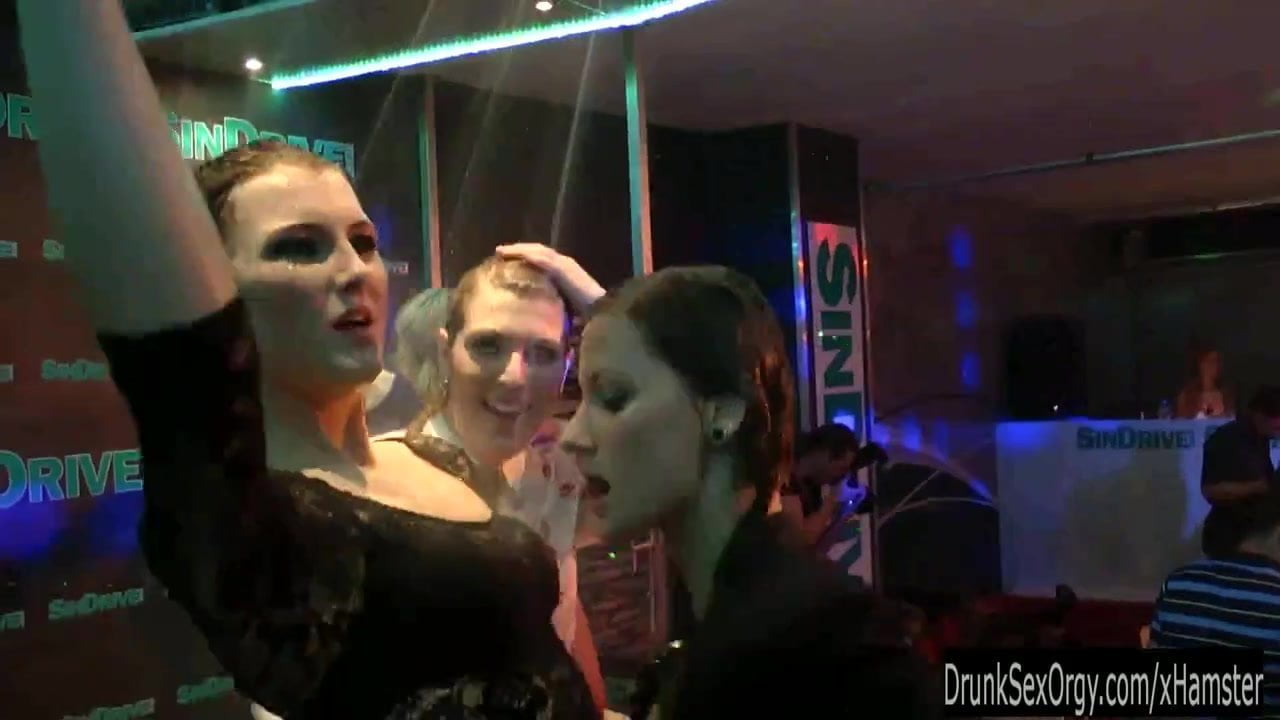 Wet girls dancing erotically in a club