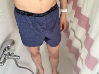 Boy is pissing in calvin klein underwear