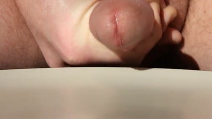 Another load of close-up cum from my circumcised cock 