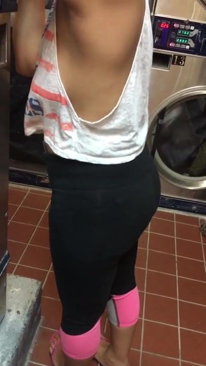 Wife side boob doing laundry 