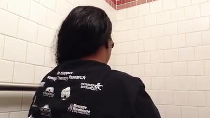 Black Mama on Toilet