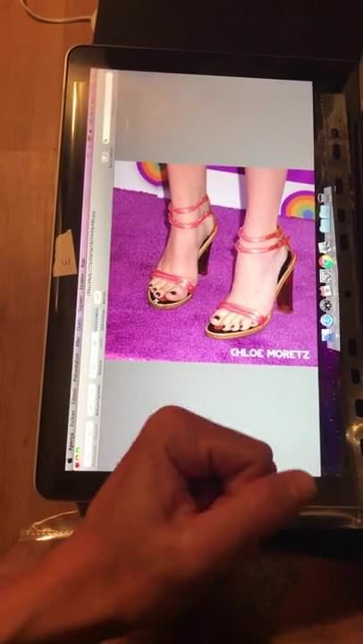 Cumming on Chloe Moretz's feet.