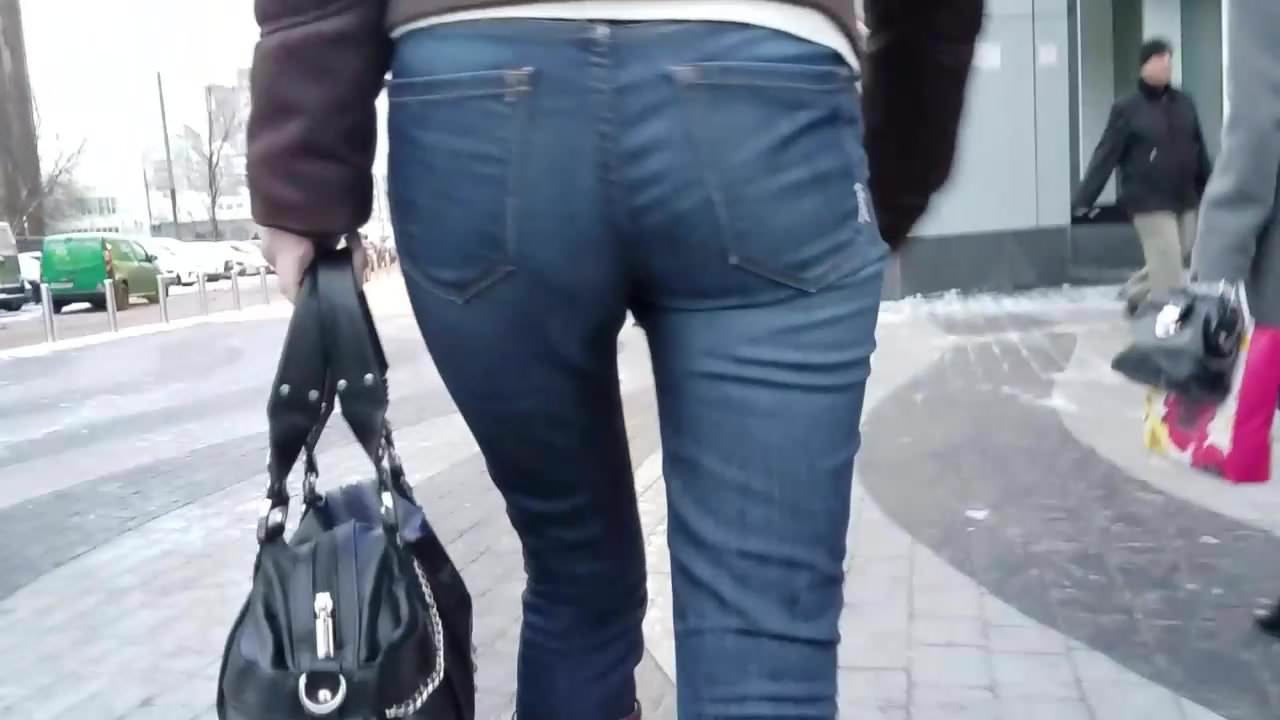 Ass in blue jeans go to the office