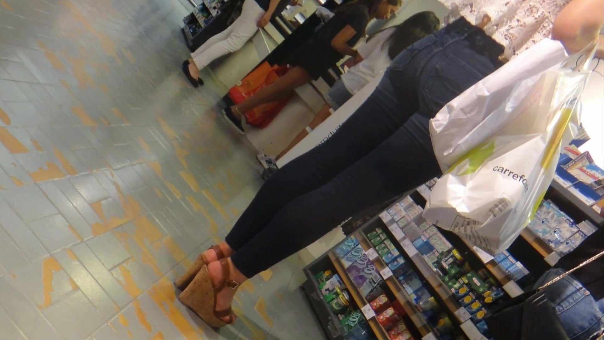 Candid hot brunette tight jeans and wedges heels