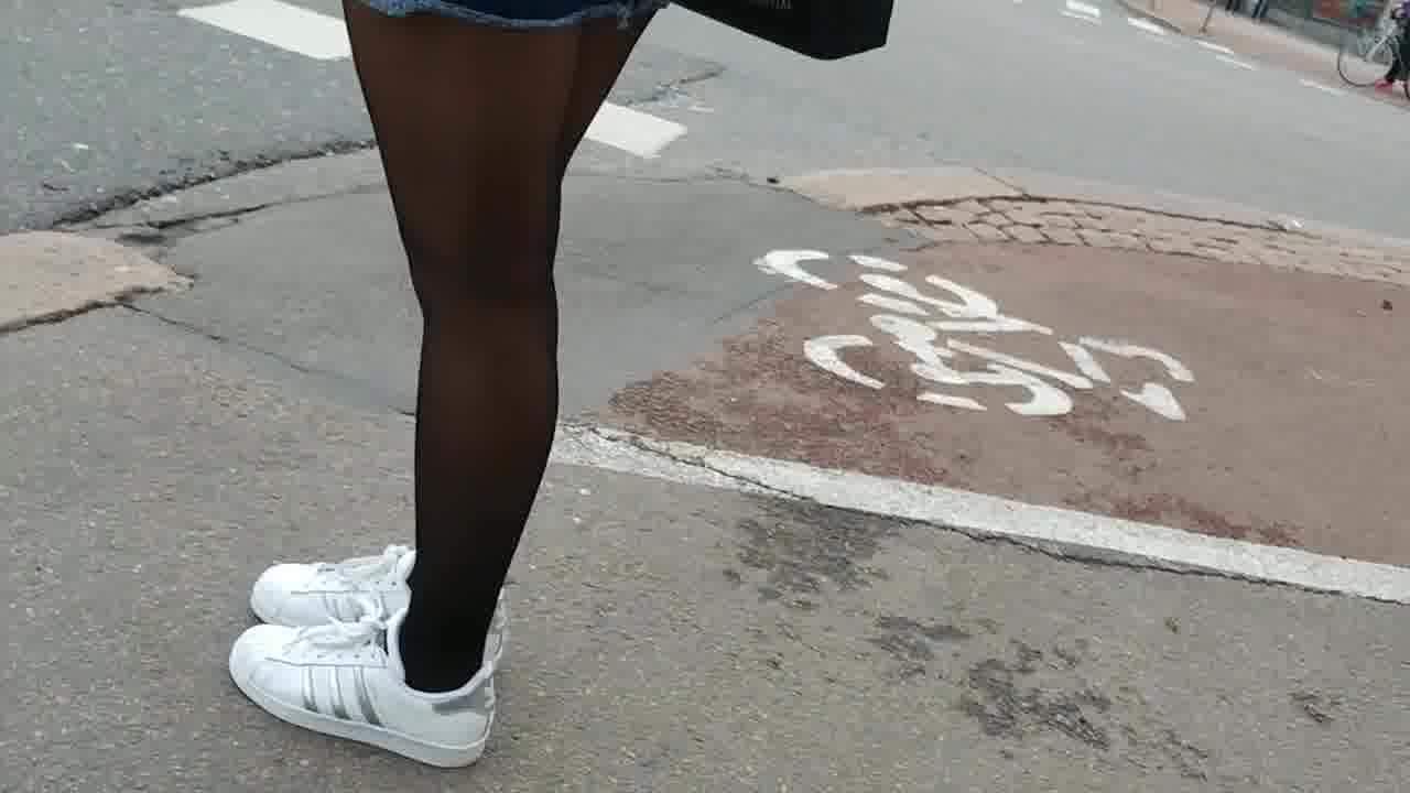 Pantyhose and sneakers in street