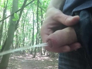 taking a piss in the woods