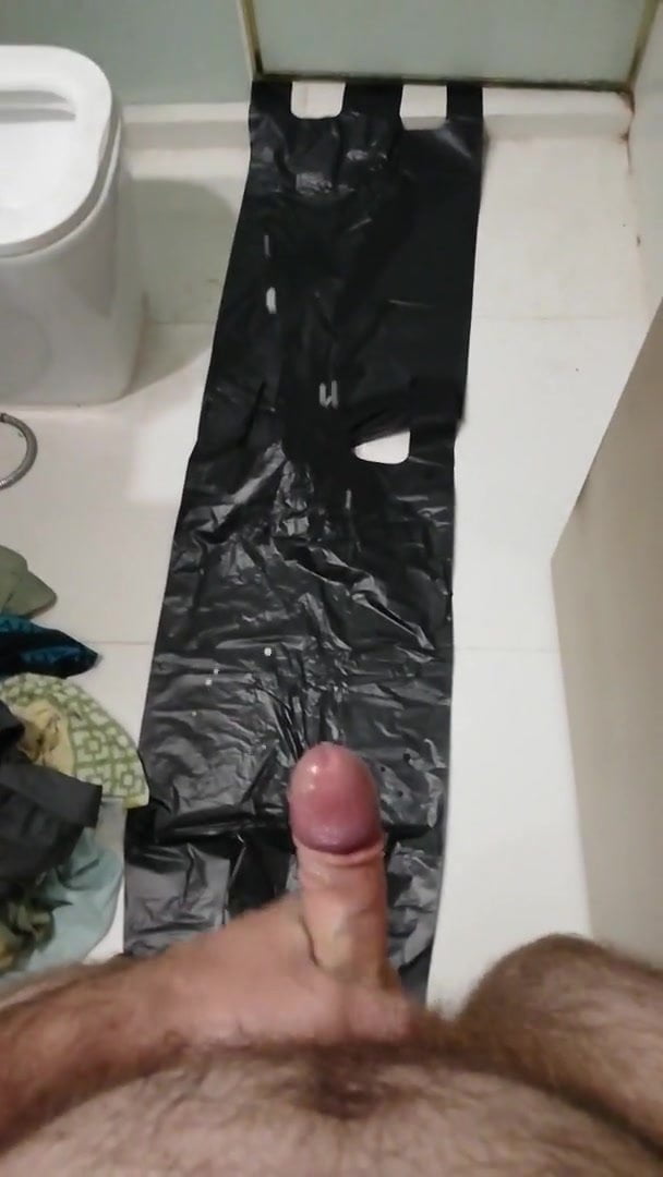 Huge cum on black bags in the bathroom