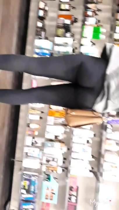 Teen in leggings shopping 