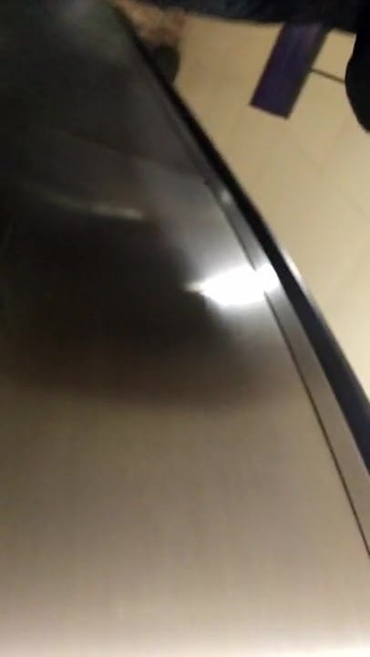 Sexy legs upskirt on elevator