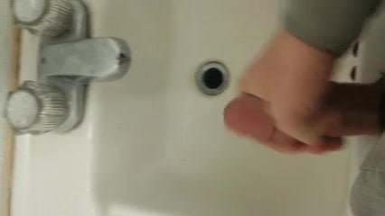 jerk and cum in a store bathroom