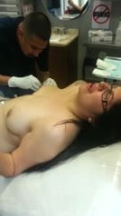 girl getting nipples pierced