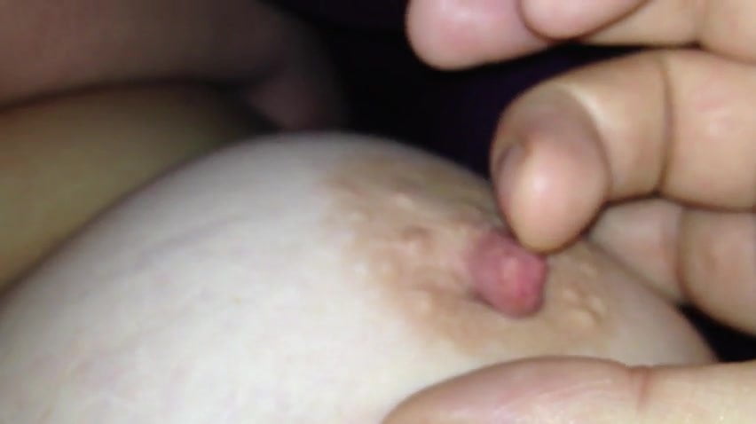 Playing with the wife's nipple