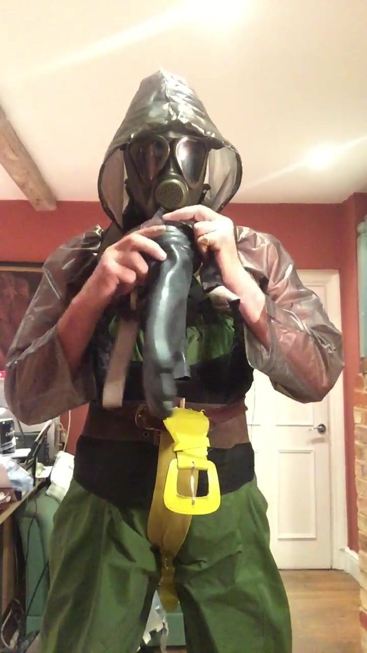 rainsuit,waders and gas mask