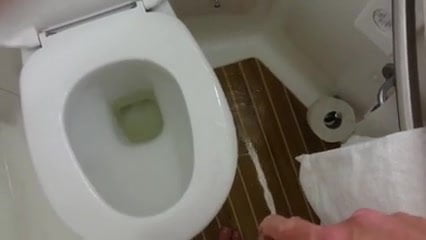 messy piss in hotel toilet