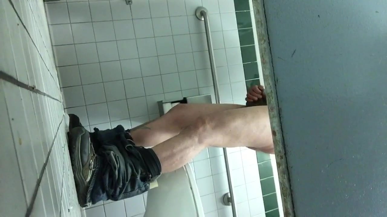 Caught dude jerking off in men's room stall (part 1)