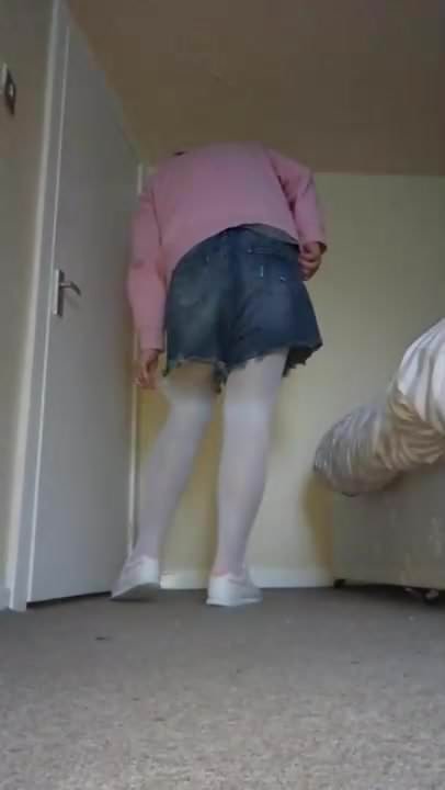 Transvestite wearing white tights