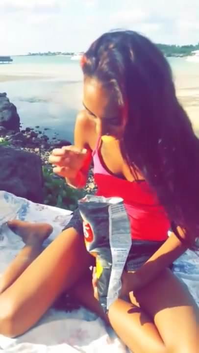 Sexy Brunette smokes and plays outside