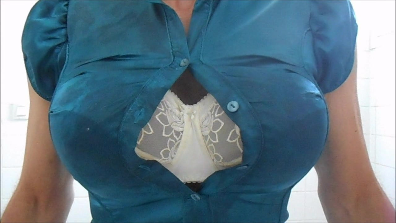 big bra in sexy satin blouse .