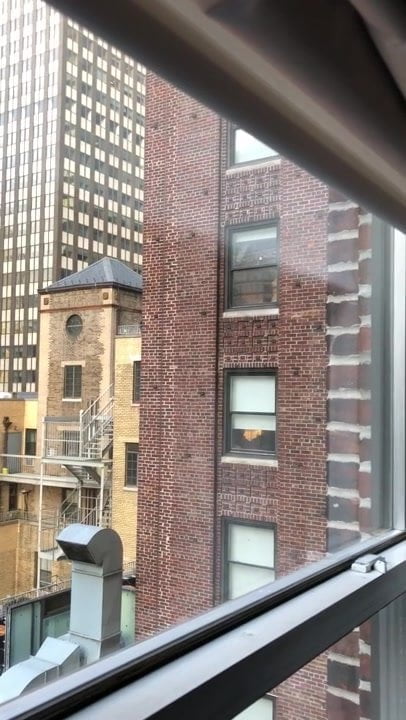 NYC hotel window voyeur blonde in bra & panties