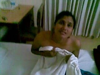 Newly Married Couple On Hotel Bed 2