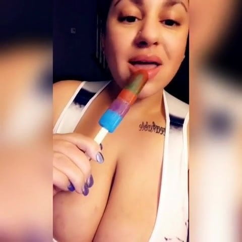 Sexy BBW latina sucking on a popsicle. 
