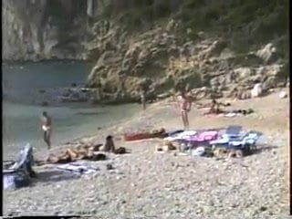 Beach candid topless from 1990